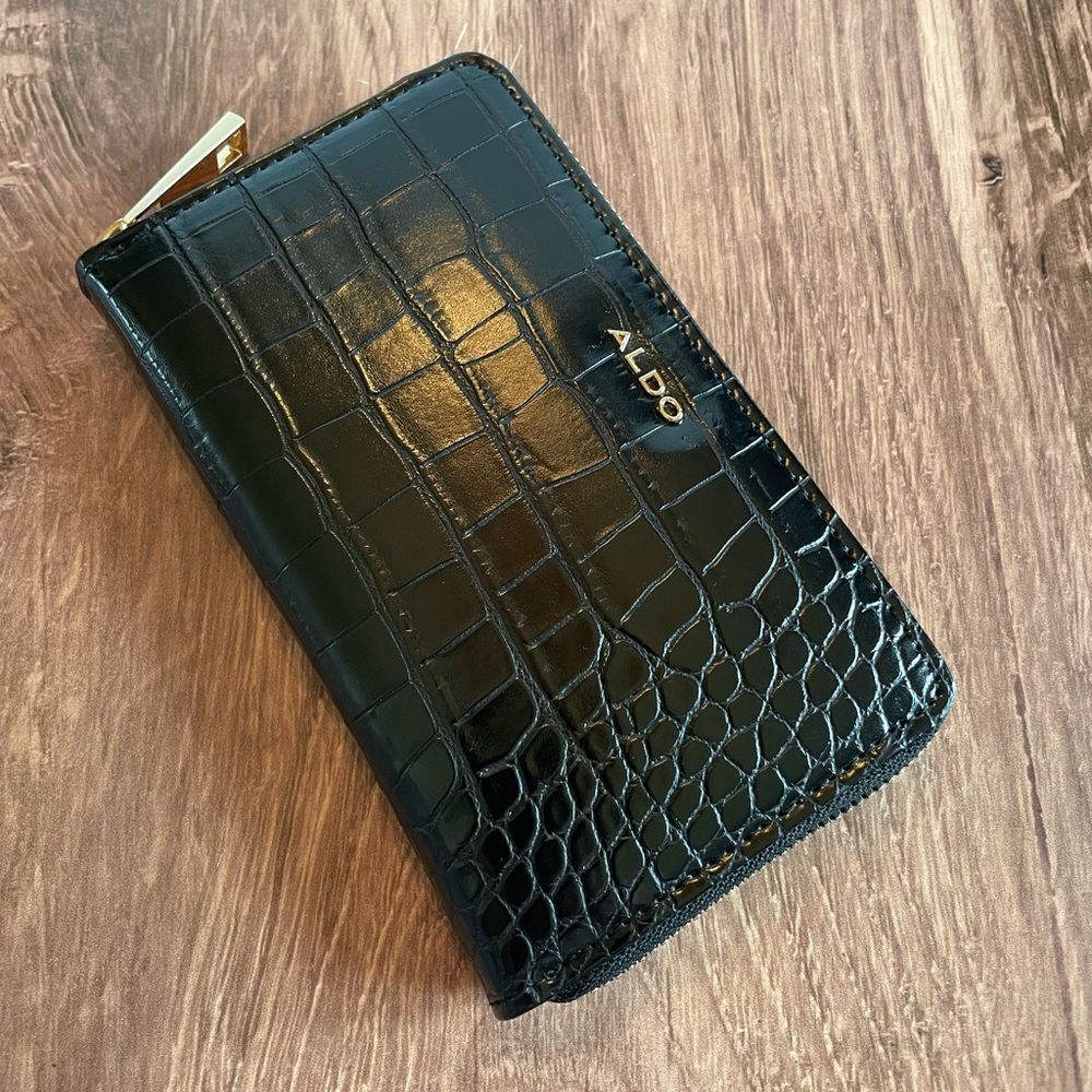 ALDO Black Kedoe Faux Crocodile Zip Wallet with Gold Hardware.